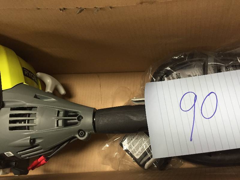 lot 90 image: Ryobi 4-Cycle 30cc Attachment Capable Straight Shaft Gas Trimmer never used Stock and actual photos used to display item