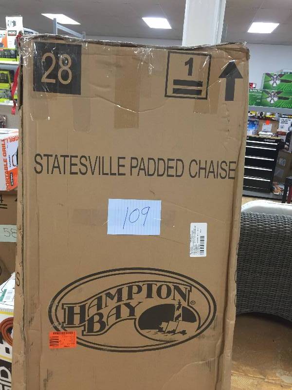 lot 109 image: Hampton Bay Statesville Padded Patio Chaise Lounge Never Used Stock and actual photos used to display item