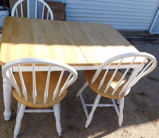 dining room table with three chairs