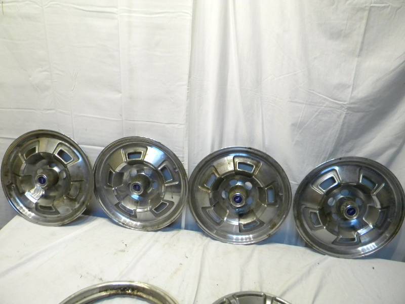 lot 23 image: Vintage Hubcaps
