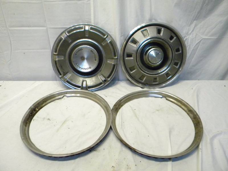 lot 24 image: Vintage Hubcaps and Dodge Division Rings