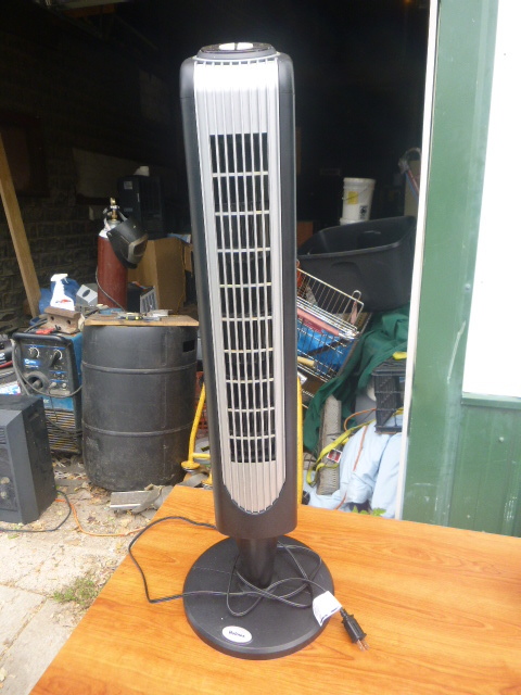 lot 21 image: Holmes Standing Heater with Remote