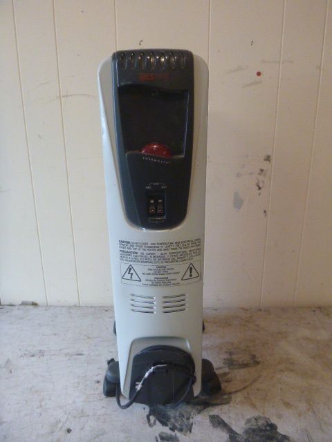 lot 104 image: DeLonghi Portable Heater