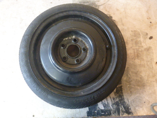 lot 111 image: Uniroyal Hide Away Spare Tire