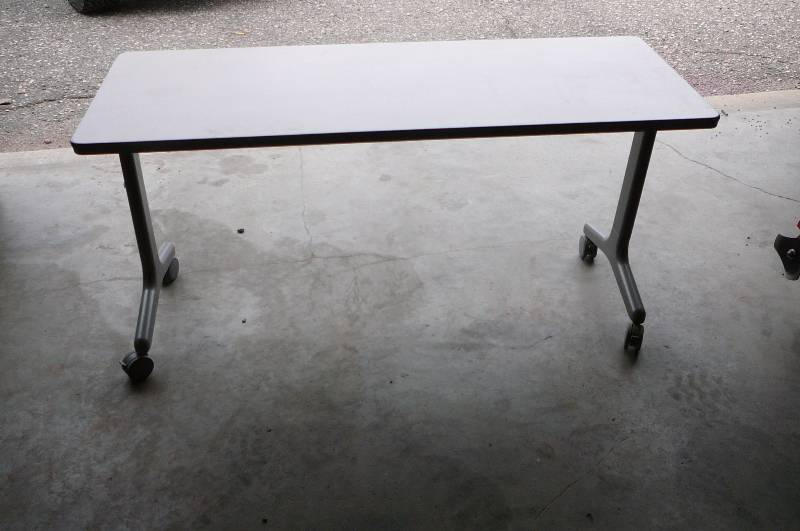 lot 23 image: Table on wheels
