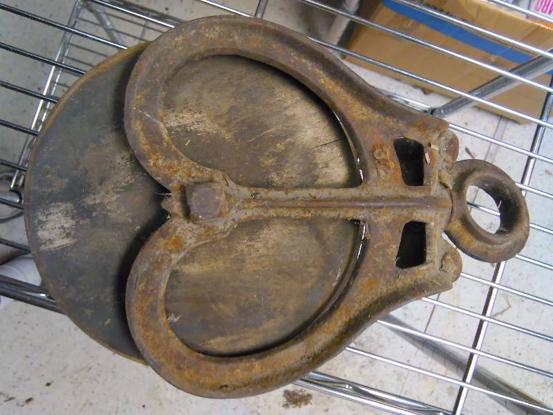 Vintage Hay Loft Barn Pulley, wood roller, Cast frame, swivel, number 32 stamp on it