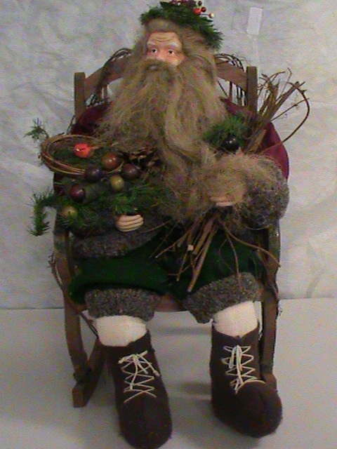 lot 100 image: Santa in Rocking Chair