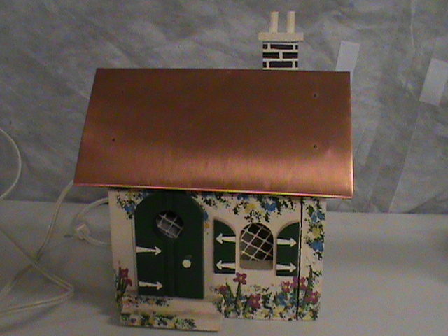 lot 135 image: Light up Music Box house