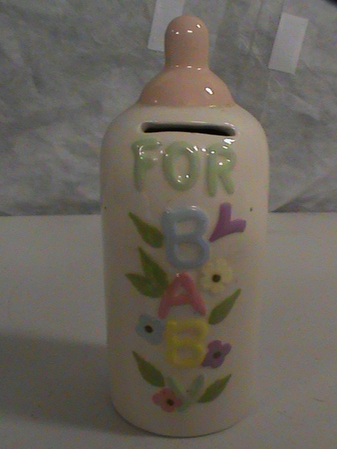 lot 167 image: Vintage Baby Bottle Bank - 1979