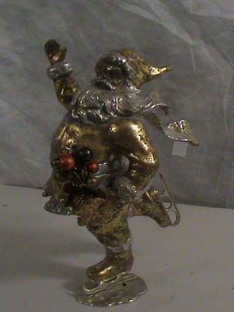 lot 210 image: Ice Skating Santa