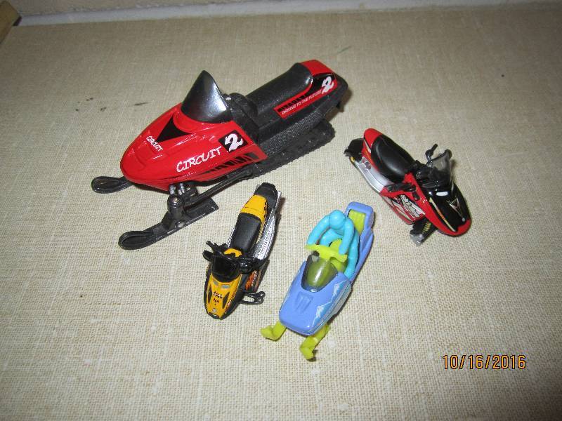 Lot of toy snowmobiles...
