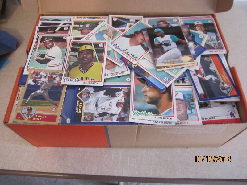 Shoebox filled with assorted sports...