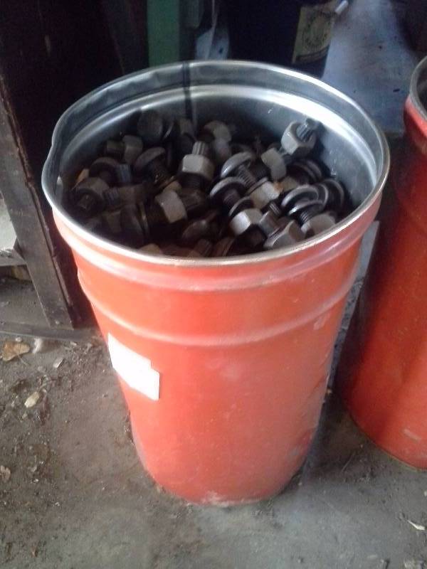 Bucket of Tension Control Bolts, Washers, and Nuts