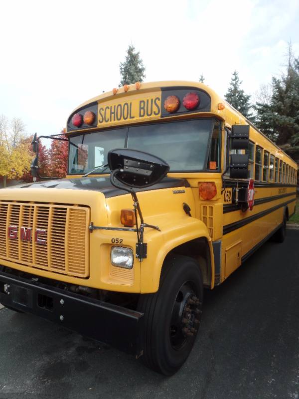 lot 104 image: GMC Bluebird School Bus