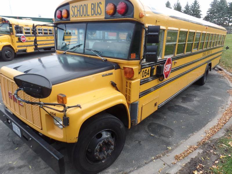 lot 105 image: GMC Bluebird School Bus