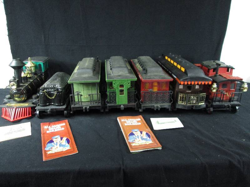 lot 113 image: Jim Beam 7 Piece Train & Decanters Set