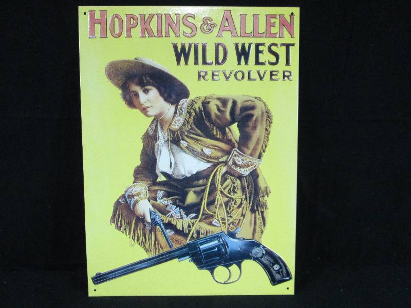 lot 199 image: Hopkins & Allen Wild West Revolver Embossed Tin Sign