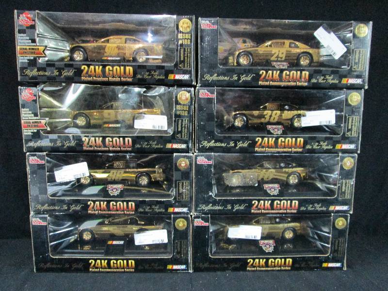 lot 214 image: 1- 24 Scale Collectable gold Nascar Cars