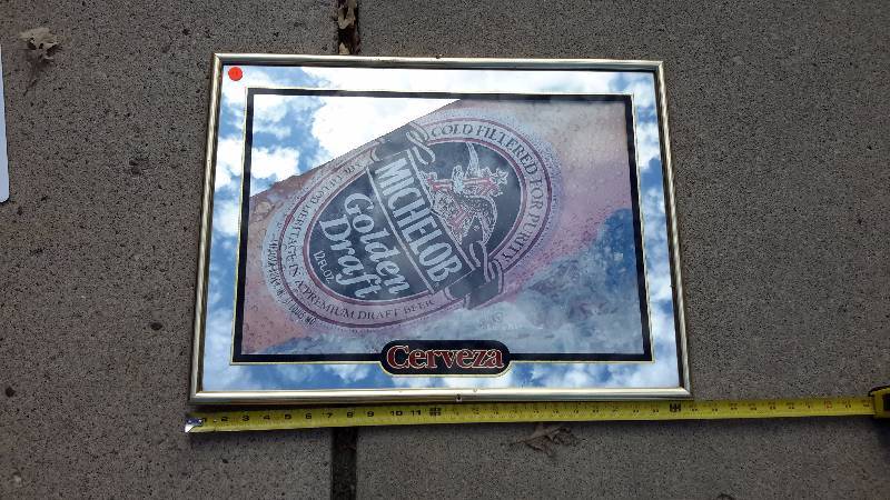 A framed Michelob Golden mirror sign from 1992.