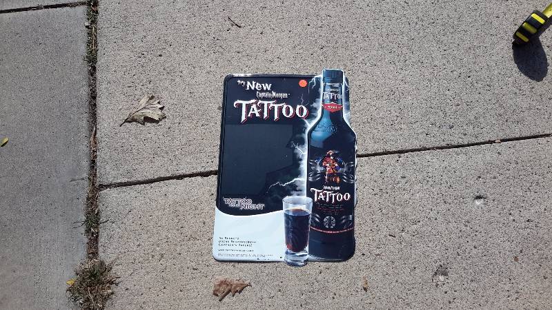 Aluminum Capt. Morgan tattoo liquor sign