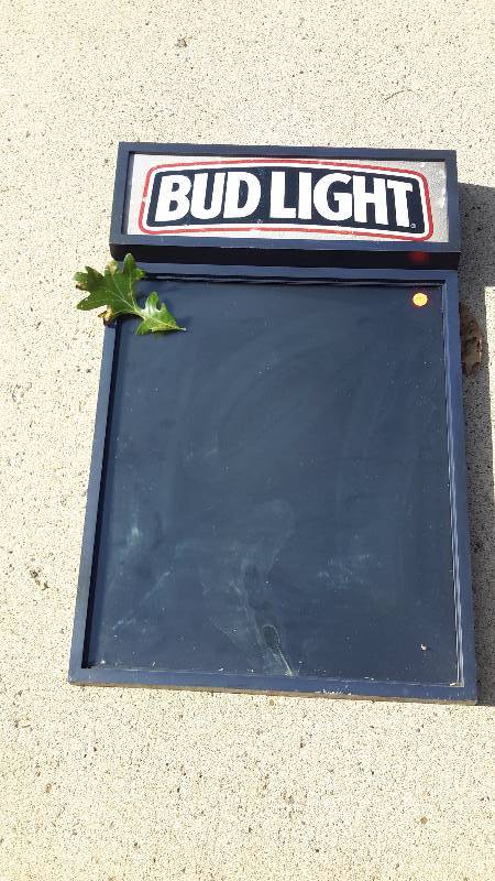 A lighted Bud Light sign