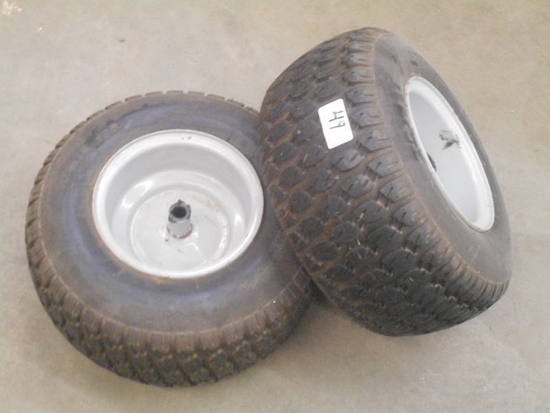 lot 49 image: (2) 188.5 Lawn Tractor Wheels & Ti...