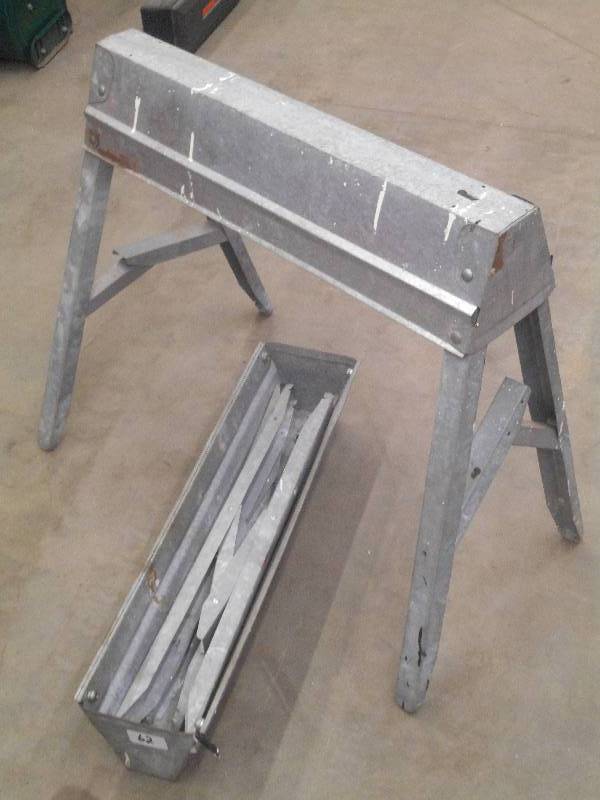 lot 62 image: (2) Galvanized Folding Saw Horses ...