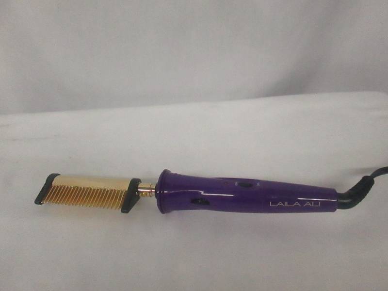 lot 59 image: Laila Ali Pressing Comb