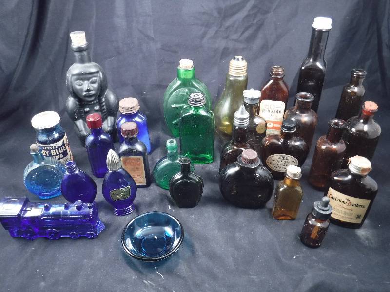 lot 33 image: Lot of Vintage Colored Glass BottlesJarsDecanters