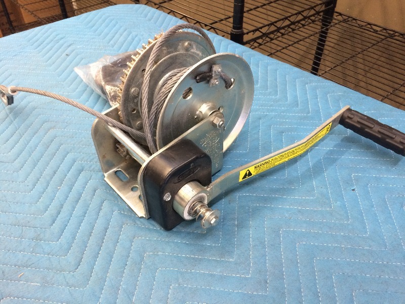 lot 14 image: Hand Winch  1500 lb.   Tilt & Drain Oil Kit (new)