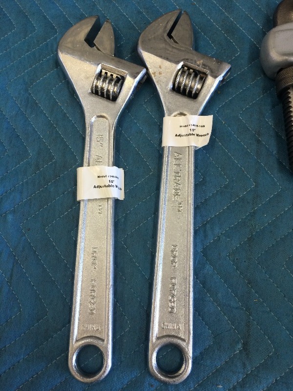 lot 63 image: Assorted hand Tools  15 Adjustable Wrenches 18 Pipe Wrench & hammer    NEW  lot of 4