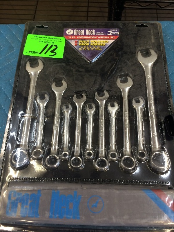 lot 113 image: 11 Piece Combination wrench set, Dewalt Drill Bit holder, Drill Index set  NEW