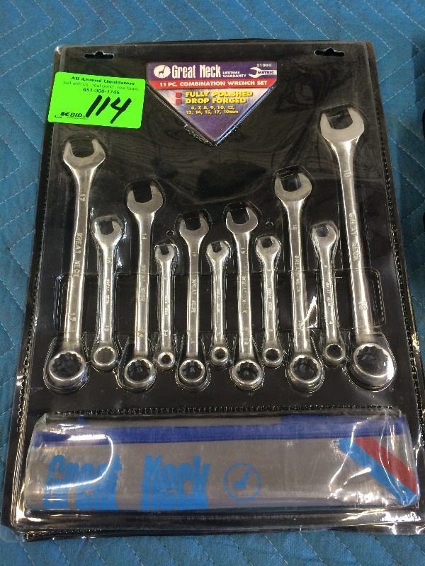 lot 114 image: 11 Piece Combination wrench set, Dewalt Drill Bit holder, Drill Index set  NEW