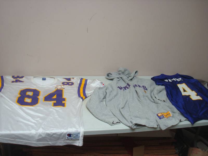 lot 110 image: Vikings Sweat Shirt And Two Jerseys, Used, Some Wear Large And X-Large