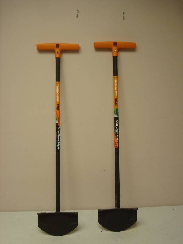 lot 128 image: Pair Of Fiskars Edgers, Store Shelf Pull, Unused, May Show Some Marks