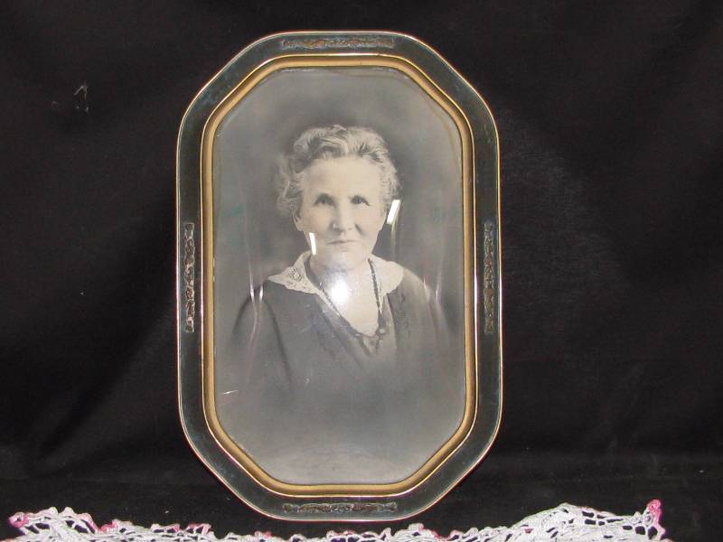 lot 63 image: Framed Curved Glass Picture