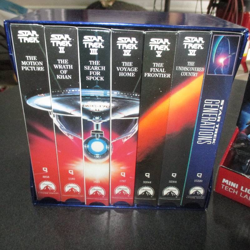 VHS TAPES AND MINI LIGHTSABER