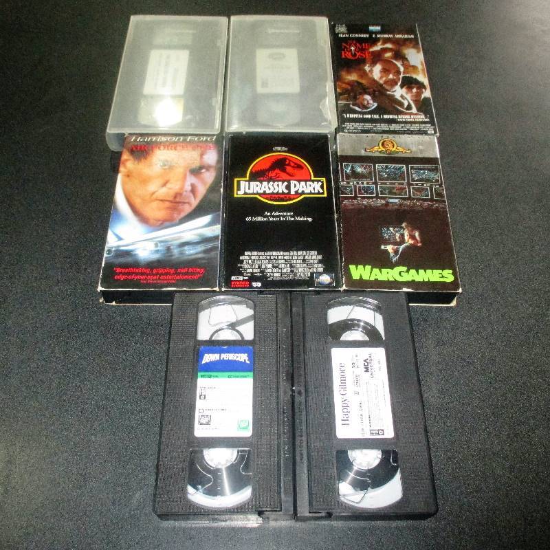 8 VHS TAPES