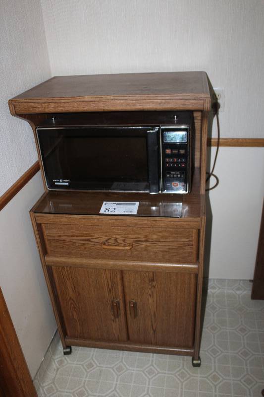 lot 82 image: Microwave & Cabinet