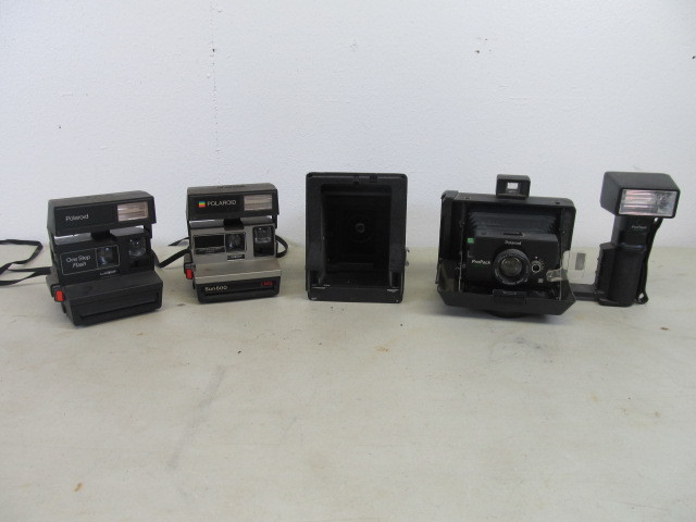 lot 25 image: Group of Vintage Polaroid Cameras