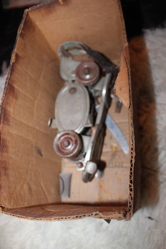 Box Lot of Vintage Metal Rolling Skates