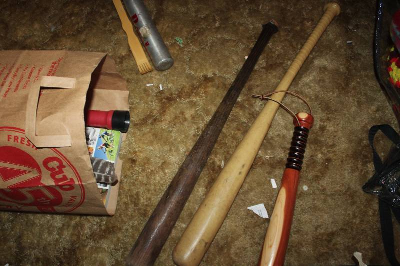 Lot of Sporting Equipment Including Bats, Soccer Ball, And More