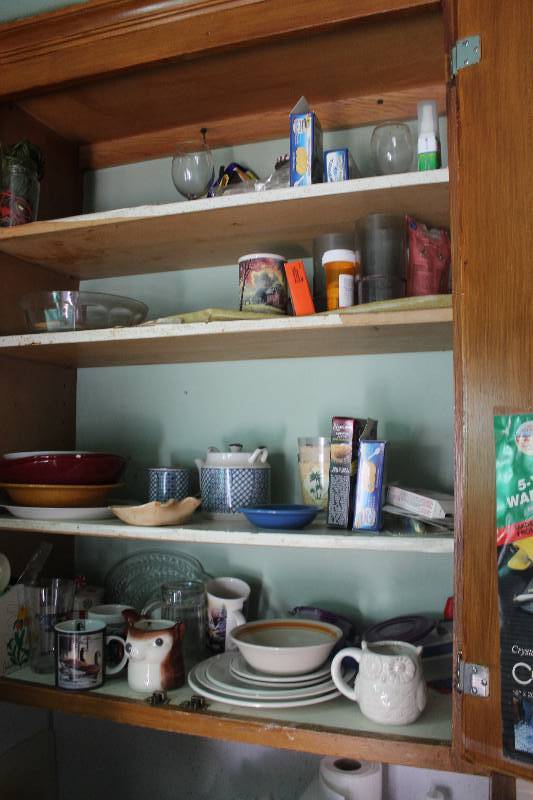Contents of Cabinet Including Kitchenwares, Decorations