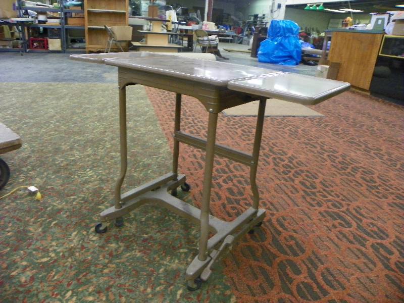 lot 270 image: Metal Table On Wheels