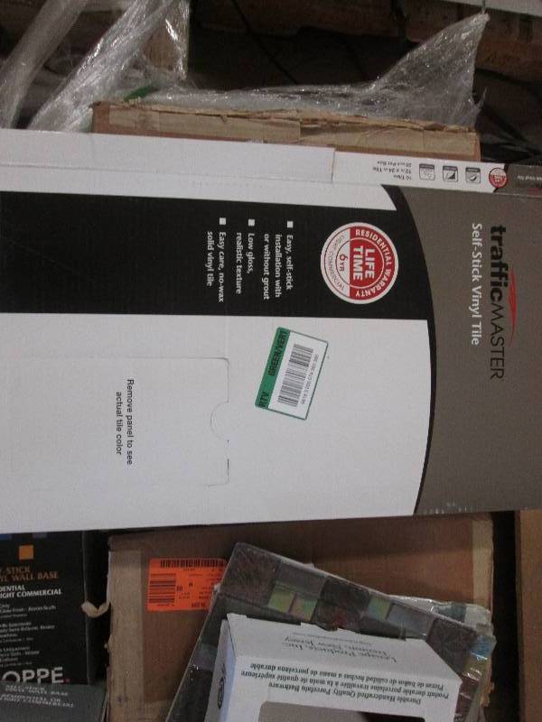 lot 60 image: Lot of 4 cs Traffic Master 12 in. ...