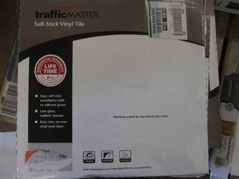 lot 64 image: Lot of 3 cs  Traffic Master Grouta...