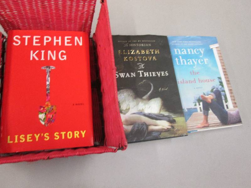 lot 127 image: 3 Hardbound books in wicker basket...