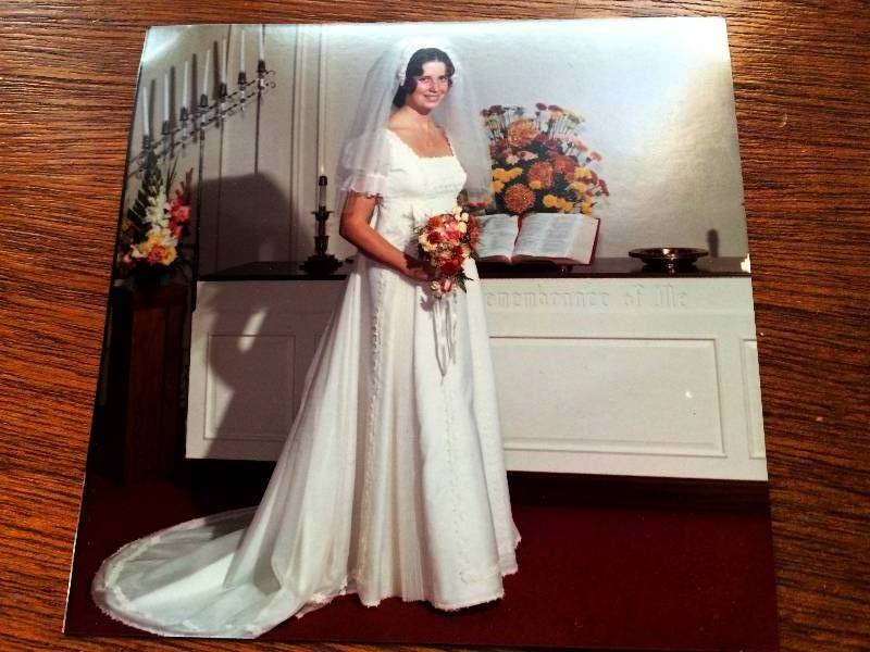 lot 18 image: Vintage Bridal Wedding Gown Stored In Sealed Box - Seal is intact so unable to check condition.