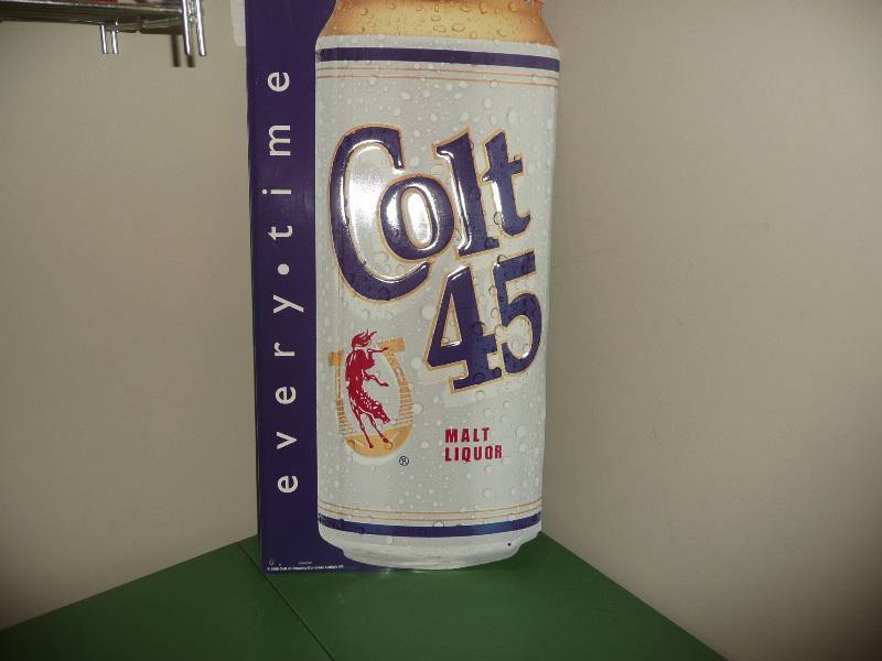 lot 9 image: Vintage Colt 45 Malt Liquor Tin - Good Condition - Large Approx 16in wide by 32in high