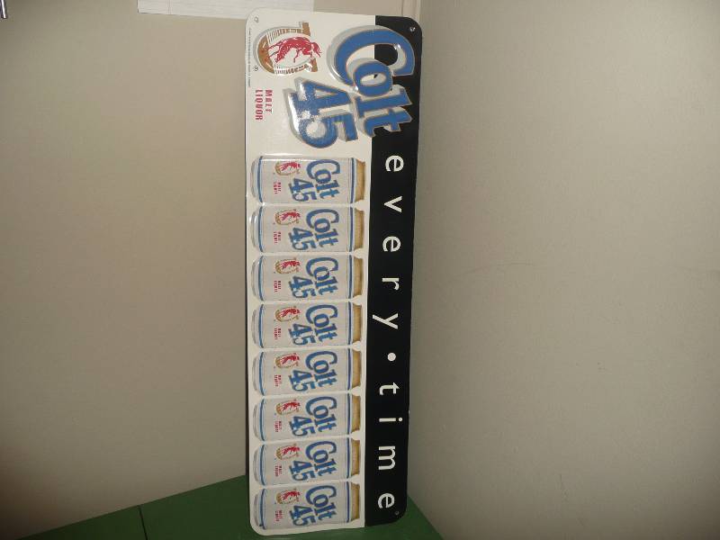 lot 13 image: Vintage Colt 45 Malt Liquor Tin - Good Condition - Approx 28in wide by 10in high